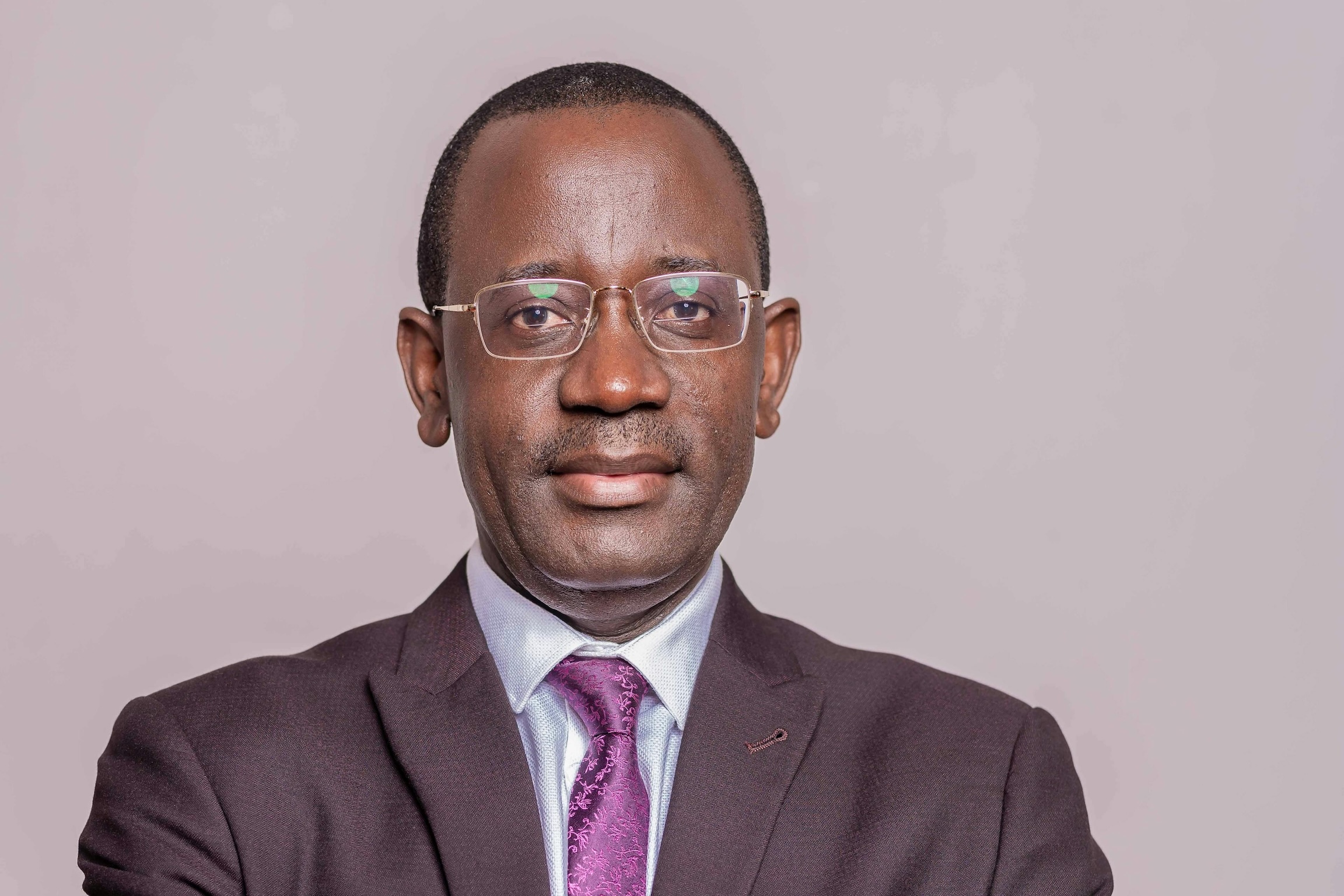 Godfrey Byekwaso Appointed Acting Managing Director Of Centenary Bank Malawi 