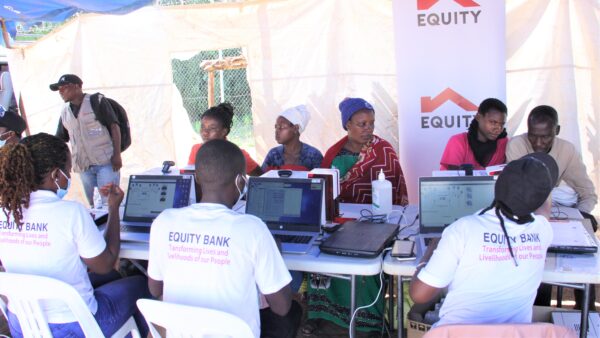 refugees-being-served-by-equity-bank-uganda-limited-officials-1-600x338-1