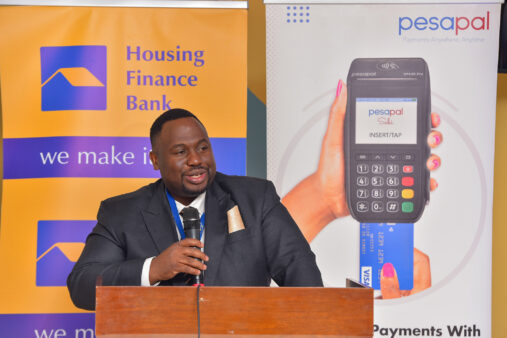 ivan-kituuka-head-of-distribution-and-alternate-channels-at-housing-finance-bank-giving-a-speech-during-the-event-at-the-bank-headquaters-in-kololo-507x338-2
