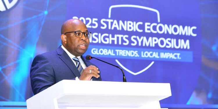 Christopher Legilisho, Economist at Stanbic Bank making remarks during the recently concluded Economic Forum in Kampala (PHOTO/Courtesy).
