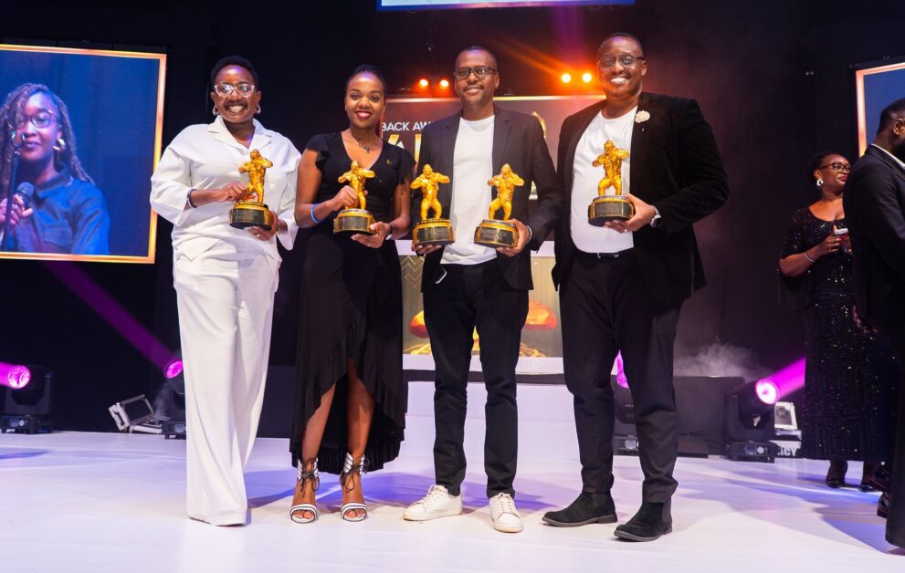 emmy-hashakimana-awards-991x628-1 Emmy Hashakimana and Uganda Breweries marketing team holding awards for Tusker Lite, Johnnie Walker, Uganda Waragi, and Smirnoff campaigns at 2023 Silverback and UMEA Awards, Emmy Hashakimana, Coca-Cola Beverages Uganda, Coca-Cola Beverages Africa, Melkamu Abebe, CCBU leadership changes, Coca-Cola Leadership Changes in Uganda, Coca-Cola Uganda leadership, Ugandan business leaders, CCBU General Manager Uganda, Beverage industry Uganda, Emmy Hashakimana appointed Coca-Cola Uganda GM, Coca-Cola Beverages Africa leadership transitions, Ugandan executives in multinational companies, Leadership succession at Coca-Cola Uganda, CEO East Africa Magazine, East Africa Business News, Business News, Uganda Business News,
