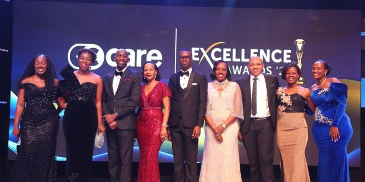 Andrew Mugalu,(3rd L), Managing Director C-Care IMC and Dr. Miriam Mutero, (4th R), Managing Director C-Care IHK pose for a picture with some of the C-Care staff at the C-Care Excellence Awards 2025