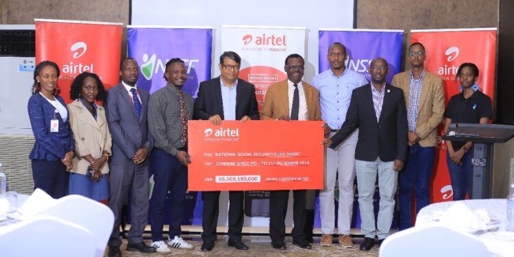 The Airtel Uganda Managing Director, Som Soumendra(5th L), NSSF's Managing Director, Patrick Ayota, with other officials from both Airtel Uganda and NSSF today, where Airtel Uganda presented a dividend cheque of UGX?50.3 billion to the National Social Security Fund (NSSF). This significant payout follows NSSF’s strategic acquisition of shares in Airtel Uganda during the company’s initial public offering (IPO).