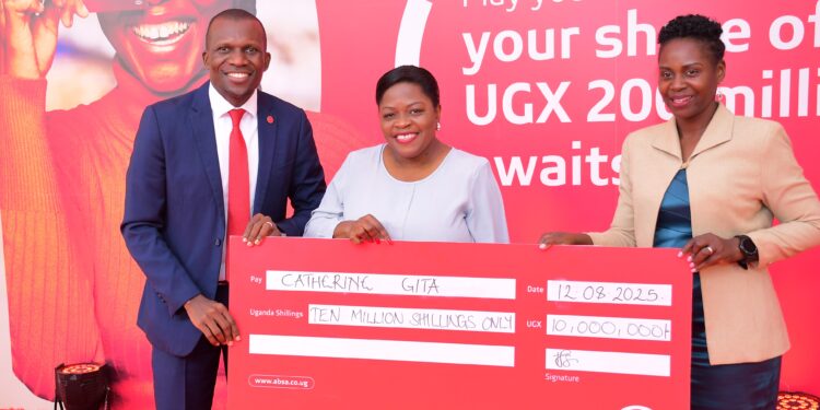 Catherine Gita, one of the July winners in the "Play Your Cards Right" campaign, poses for a photo