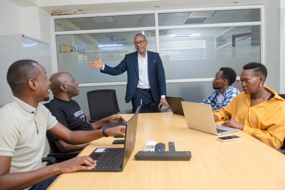 John Chihi, Founder and Lead Consultant at Media Age PR, engaging in moments that reflect his leadership, storytelling, and contributions to Uganda’s public relations industry.